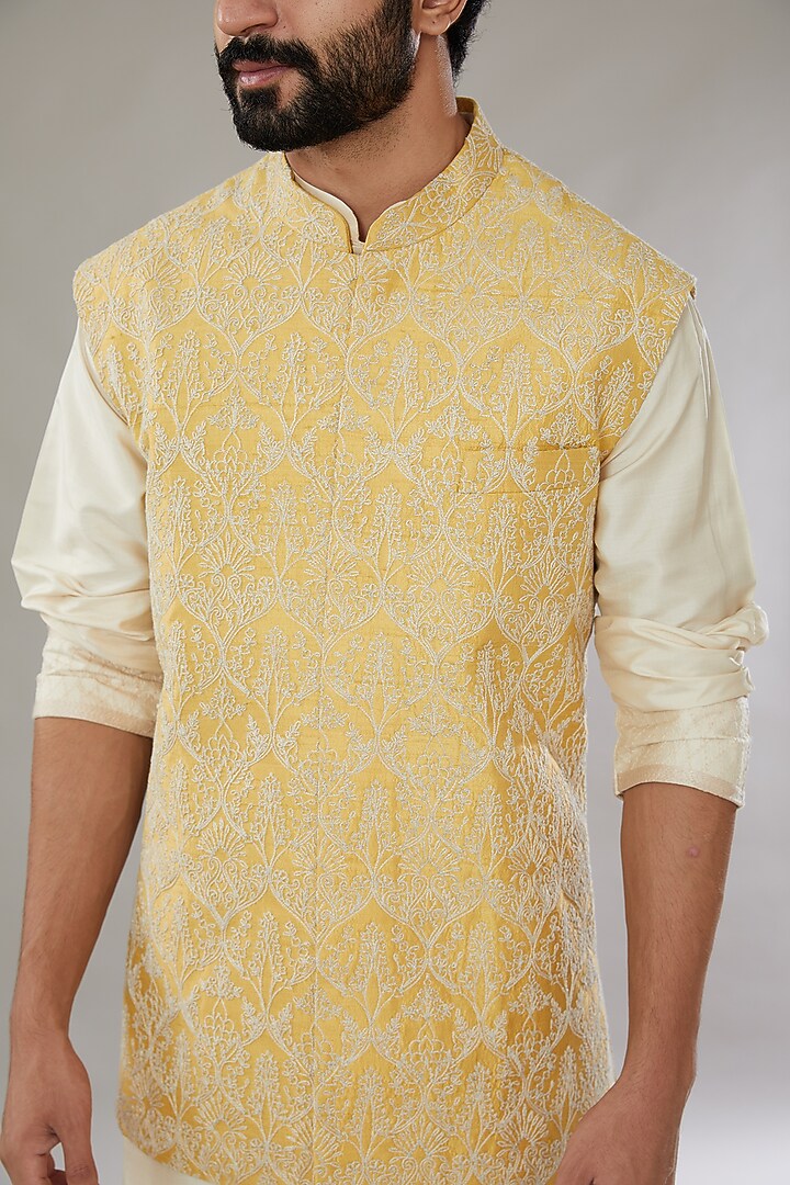 Pastel Yellow Raw Silk Embroidered Bundi Jacket Set by Anushree Reddy Men at Pernia's Pop Up Shop