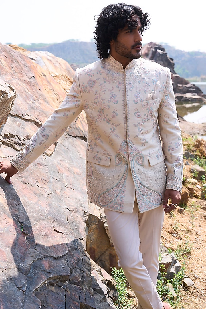 Ivory Raw Silk Thread Embroidered Groom Bandhgala Set by Anushree Reddy Men at Pernia's Pop Up Shop