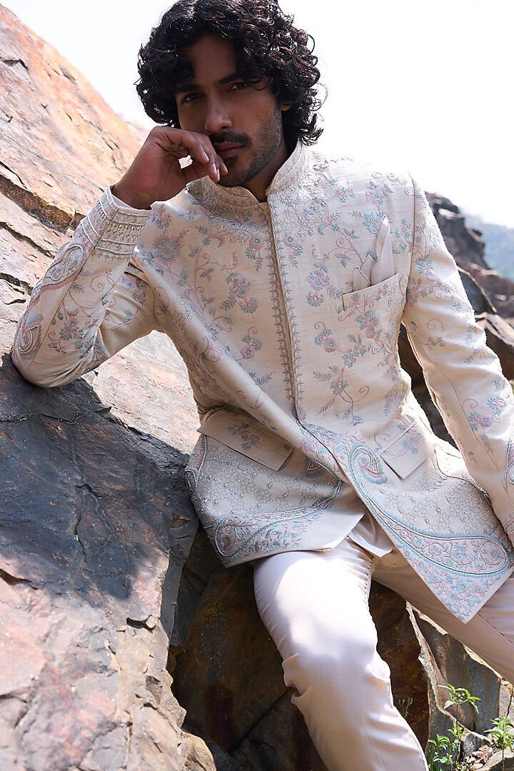 Ivory Raw Silk Thread Embroidered Groom Bandhgala Set by Anushree Reddy Men at Pernia's Pop Up Shop