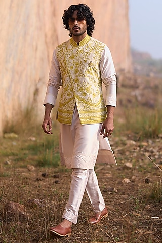 Ivory Raw Silk Thread Embroidered Asymmetric Bundi Jacket Set by Anushree Reddy Men