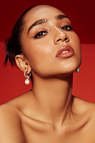 Gold Finish Pearl Dangler Earrings by Anaash