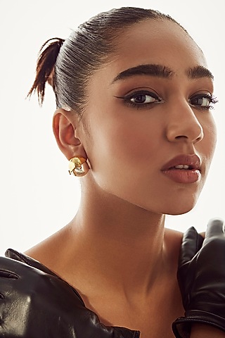 Gold Finish Pearl Stud Earrings by Anaash