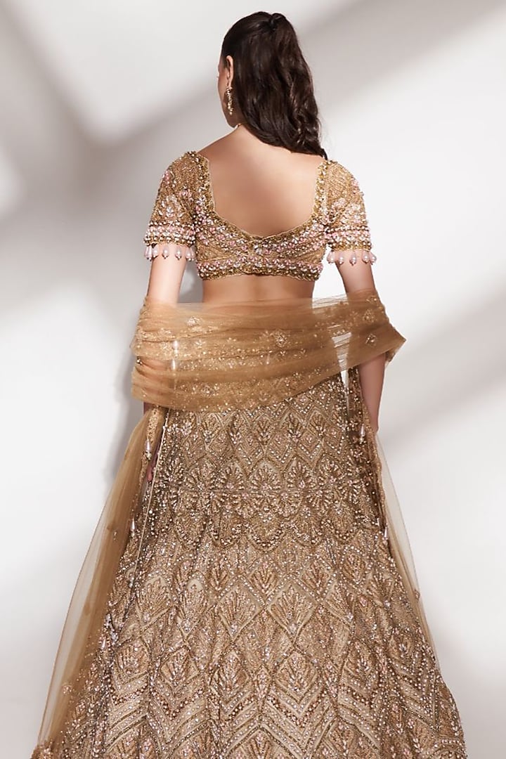 Gold Net Sequins Embroidered Bridal Lehenga Set by Anshika Tak Label at Pernia's Pop Up Shop