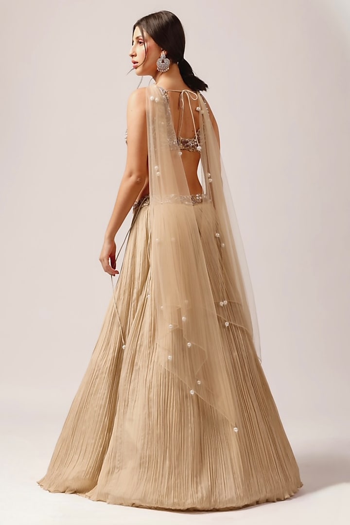 Golden Beige Crepe Embroidered Ruched Wedding Lehenga Set by Anshika Tak Label at Pernia's Pop Up Shop