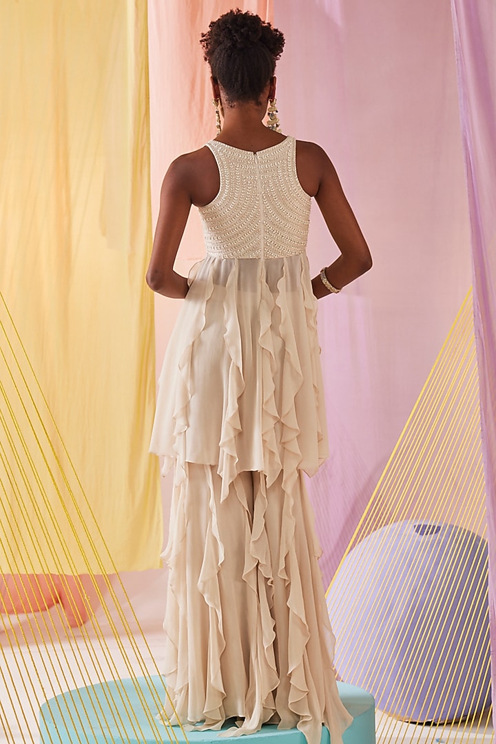 Off-White Georgette Ruffled Palazzo Set by Anu Pellakuru at Pernia's Pop Up Shop