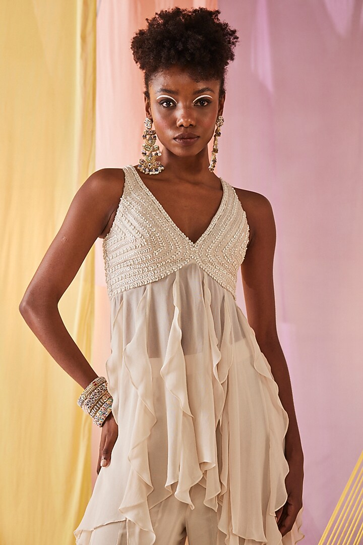 Off-White Georgette Ruffled Palazzo Set by Anu Pellakuru at Pernia's Pop Up Shop