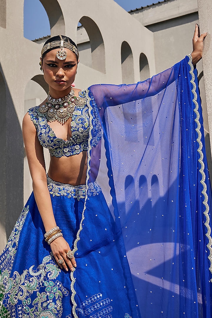Electric Blue & Emerald Green Raw Silk Resham Embroidered Bridal Lehenga Set by Anu Pellakuru at Pernia's Pop Up Shop