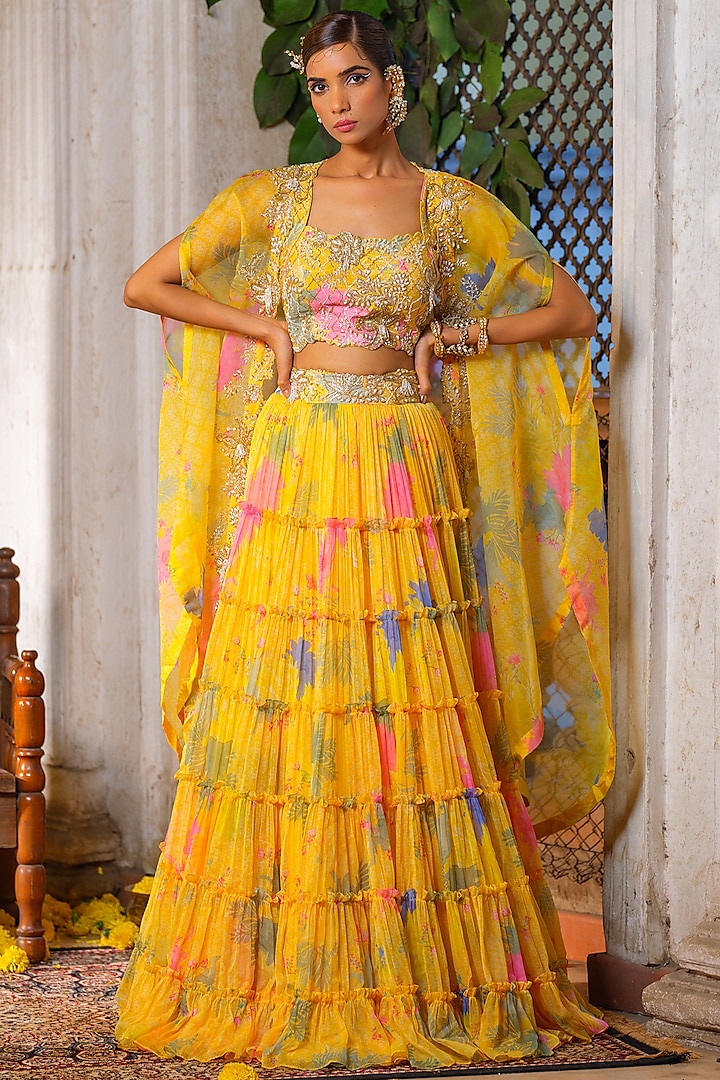 Yellow Chiffon Printed Frilled Tiered Jacket Lehenga Set by Anu Pellakuru