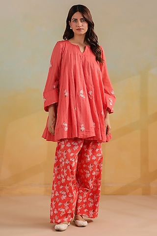 Peachish Orange Cotton Doria Work Short Kalidar Kurta Set by ANSHU WADHWA