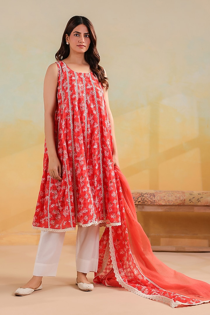 Peachish Orange Cotton Printed Sleeveless Kalidar Kurta Set by ANSHU WADHWA at Pernia's Pop Up Shop