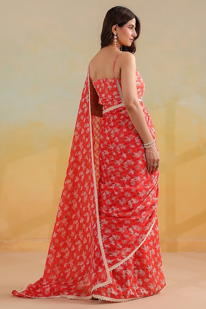Peachish Orange Cotton Floral Printed Festive Saree Set by ANSHU WADHWA at Pernia's Pop Up Shop