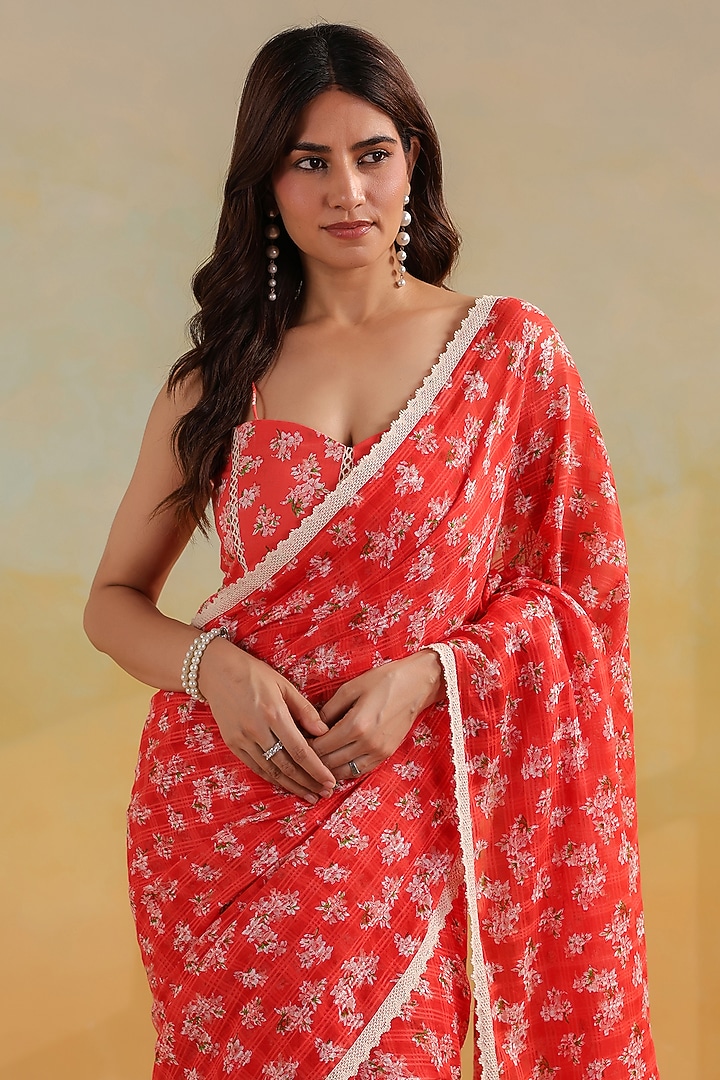Peachish Orange Cotton Floral Printed Festive Saree Set by ANSHU WADHWA at Pernia's Pop Up Shop