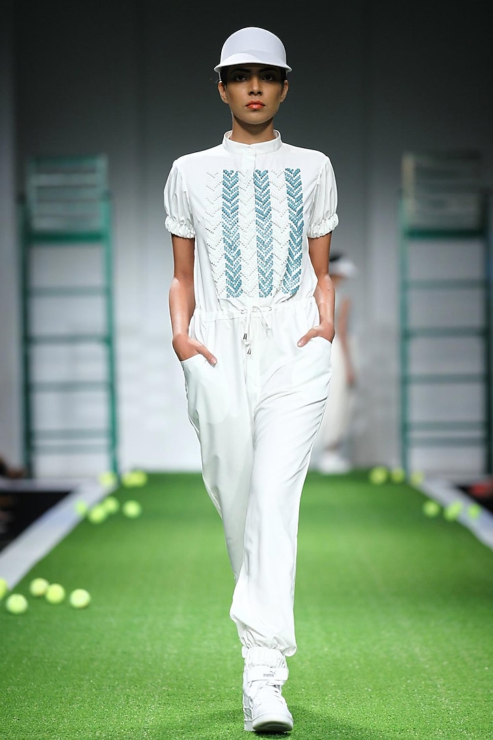 White and teal jumpsuit by Anand Bhushan