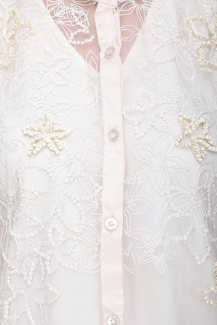 White floral embrpidered knee length jacket available only at Pernia's Pop Up Shop.
