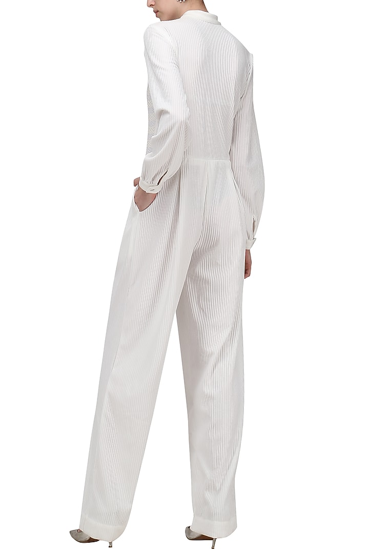 White knitted jumpsuit available only at Pernia's Pop Up Shop.