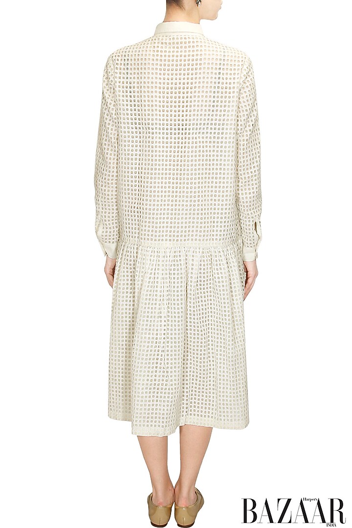 Off white cutwork flared dress available only at Pernia's Pop-Up Shop.