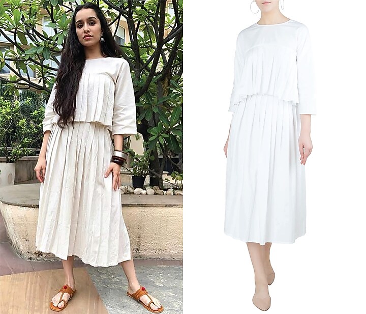 White A-line pleated midi skirt available only at Pernia's Pop Up Shop.
