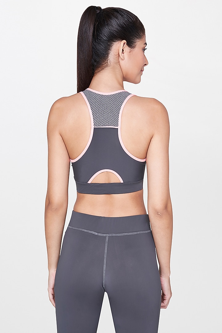 Peach Polyester Sports Bra by AND at Pernia's Pop Up Shop