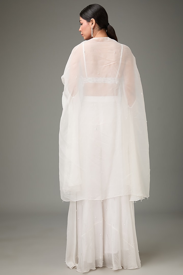 Ivory Flat Chiffon Palazzo Pant Set by ANJALIVERMA at Pernia's Pop Up Shop