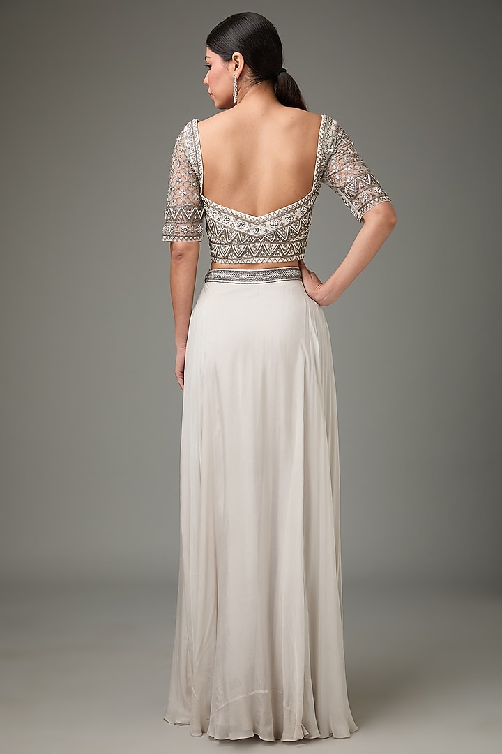 Ivory Flat Chiffon Embellished Layered Cape Wedding Lehenga Set by ANJALIVERMA at Pernia's Pop Up Shop