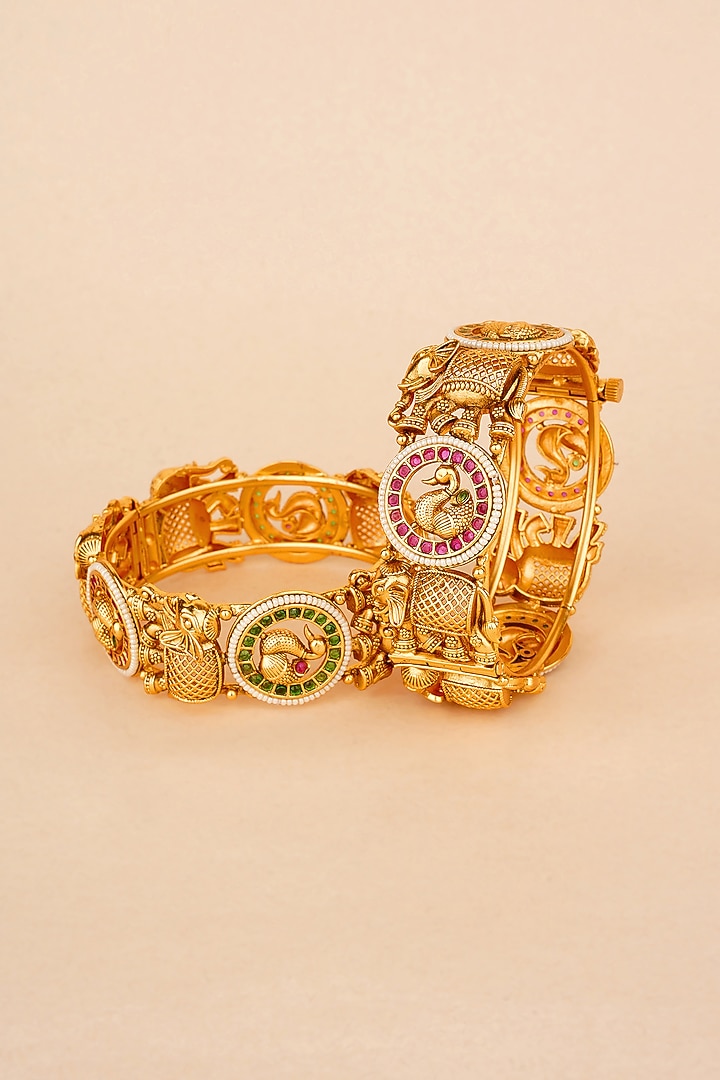 Gold Plated Kundan Polki & Red Stone Bangles (Set Of 2) by Anjali Jain Jewellery at Pernia's Pop Up Shop
