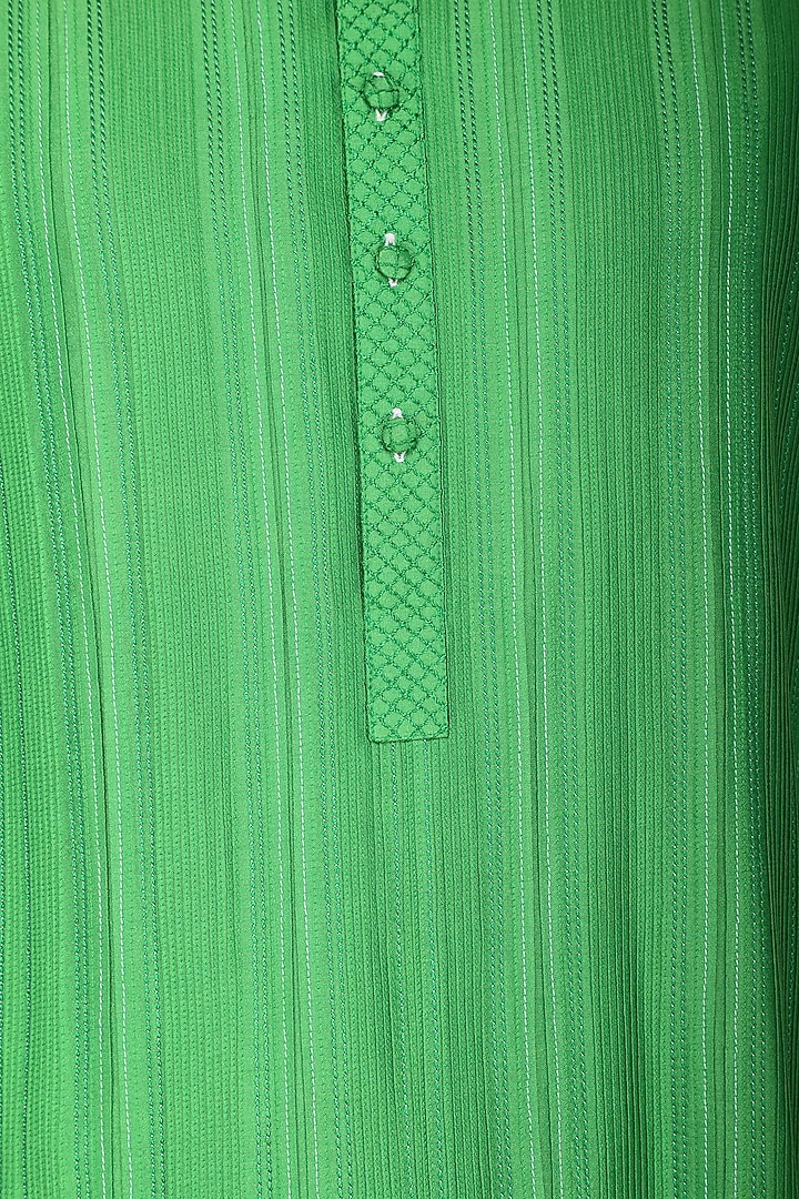 Green thread work kurta with ivory churidar pants available only at Pernia's Pop Up Shop.