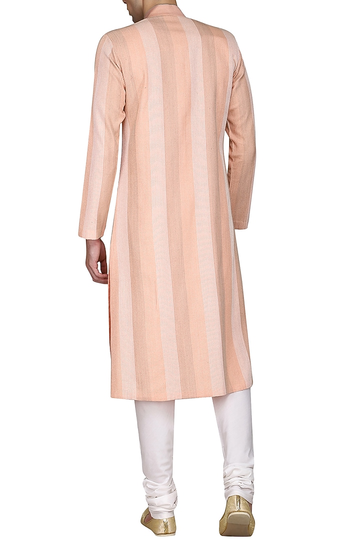 Peach thread work kurta with ivory churidar pants available only at Pernia's Pop Up Shop.