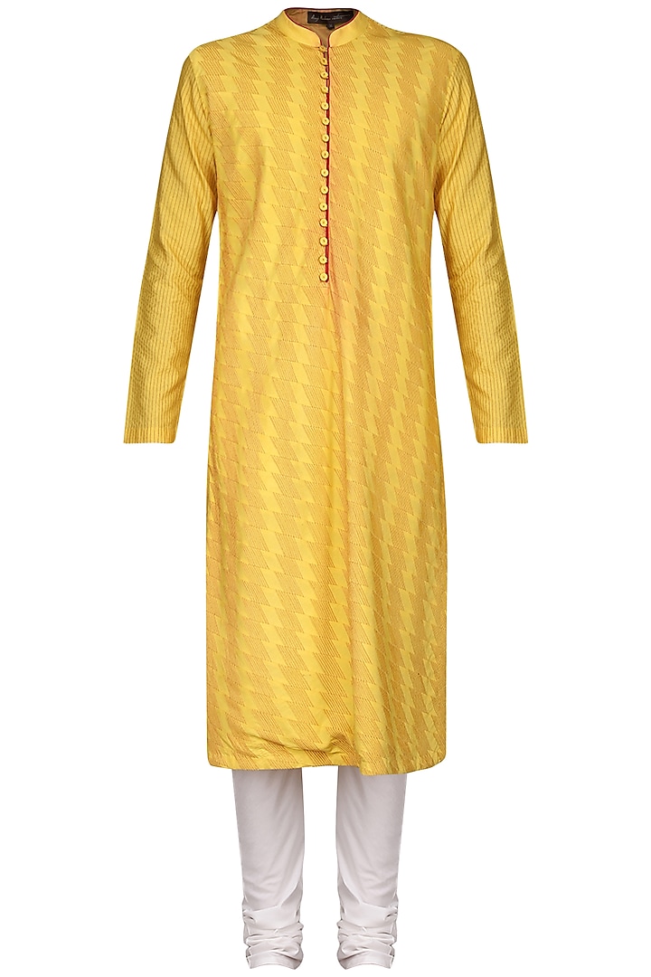 Yellow pintucks kurta with ivory churidar pants available only at Pernia's Pop Up Shop.