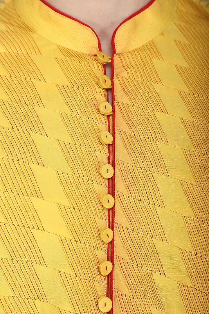 Yellow pintucks kurta with ivory churidar pants available only at Pernia's Pop Up Shop.