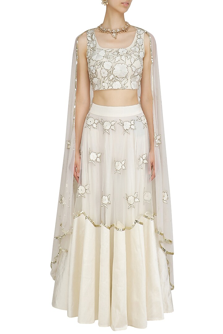 Off white floral embroidered blouse and lehenga skirt set available only at Pernia's Pop Up Shop.