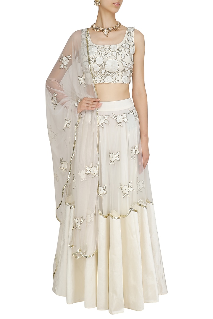 Off white floral embroidered blouse and lehenga skirt set available only at Pernia's Pop Up Shop.
