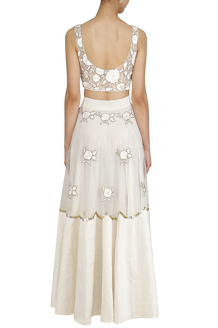 Off white floral embroidered blouse and lehenga skirt set available only at Pernia's Pop Up Shop.