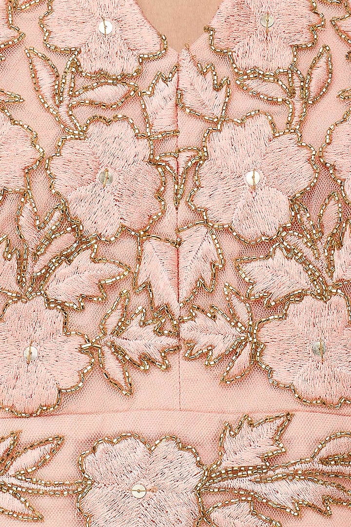 Pink zardozi embroidered tasseled crop top with cape and skirt set available only at Pernia's Pop Up Shop.