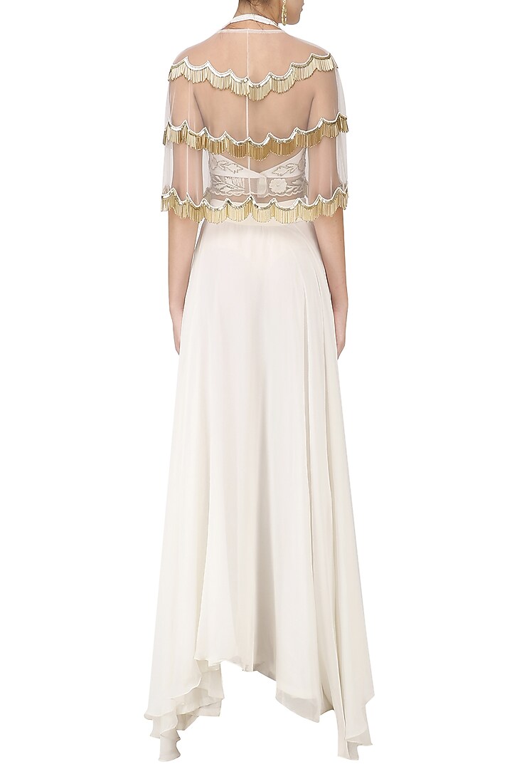 White zardozi embroidered tasseled crop top with cape and skirt set available only at Pernia's Pop Up Shop.
