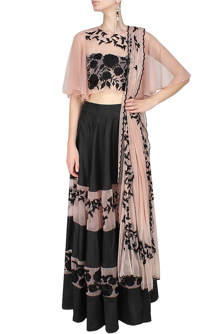 Black flowers and birds embroidered lehnega and blush blouse set available only at Pernia's Pop Up Shop.