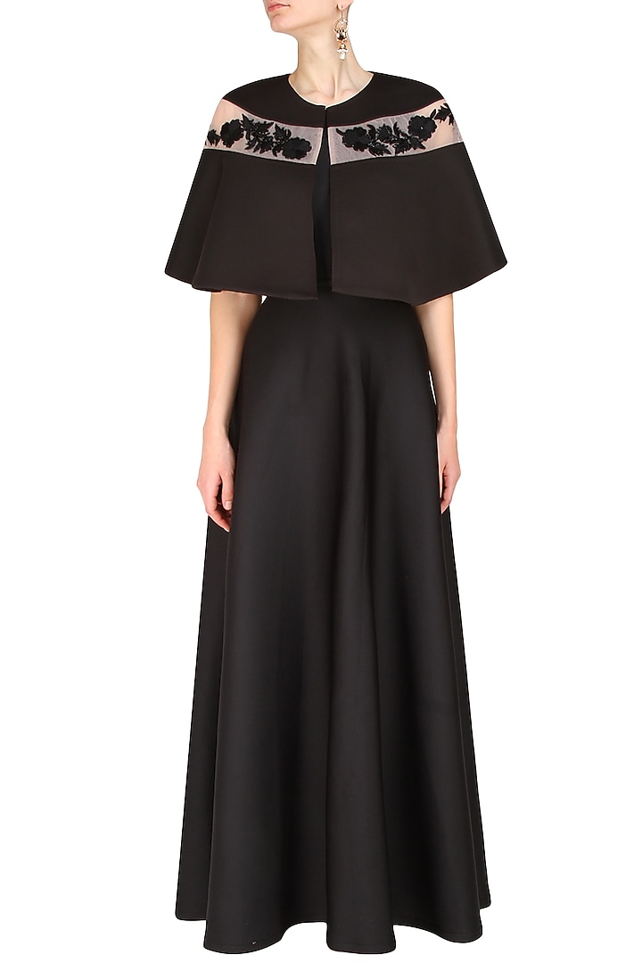 Black pleated cutout gown and floral embroidered cape set available only at Pernia's Pop Up Shop.