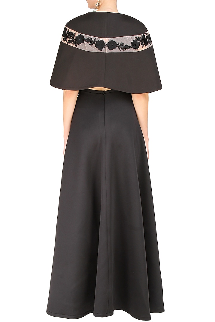 Black pleated cutout gown and floral embroidered cape set available only at Pernia's Pop Up Shop.