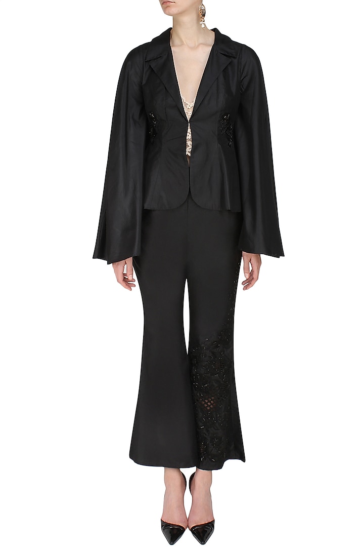 Black floral sequins and cutdana embroidered coat and flared pants set available only at Pernia's Pop Up Shop.