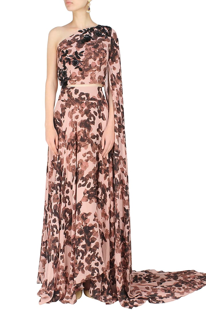 Ank by Amrit Kaur presents Peach one shoulder leave shadow top and skirt set available only at Pernia's Pop Up Shop.