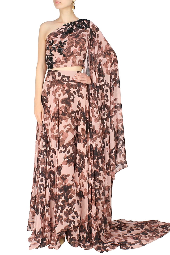 Ank by Amrit Kaur presents Peach one shoulder leave shadow top and skirt set available only at Pernia's Pop Up Shop.