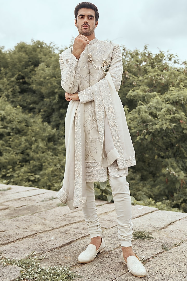 Ivory Raw Silk Thread Embroidered Sherwani Set by Anushree Reddy Men at Pernia's Pop Up Shop