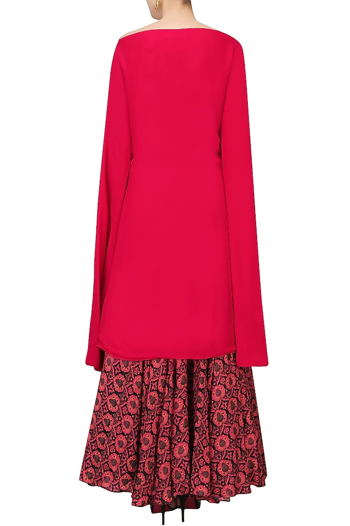 Pink embroidered cape with black and red printed skirt available only at Pernia's Pop Up Shop.