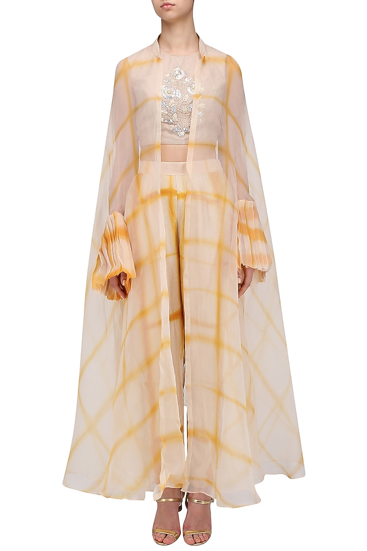 Beige and yellow shibori jacket, crop top and palazzo pants set available only at Pernia's Pop Up Shop.