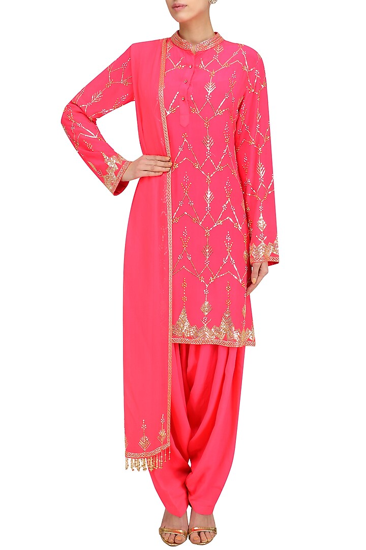 Hot pink jaal embroidered short kurta and patialla set available only at Pernia's Pop Up Shop.