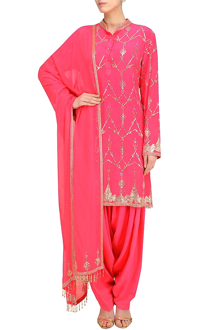 Hot pink jaal embroidered short kurta and patialla set available only at Pernia's Pop Up Shop.