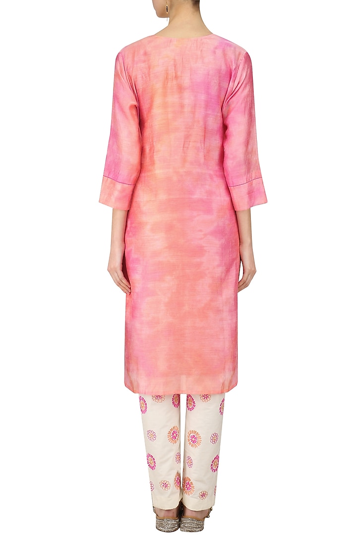 Orange shaded kurta and off white trouser pants set available only at Pernia's Pop Up Shop.