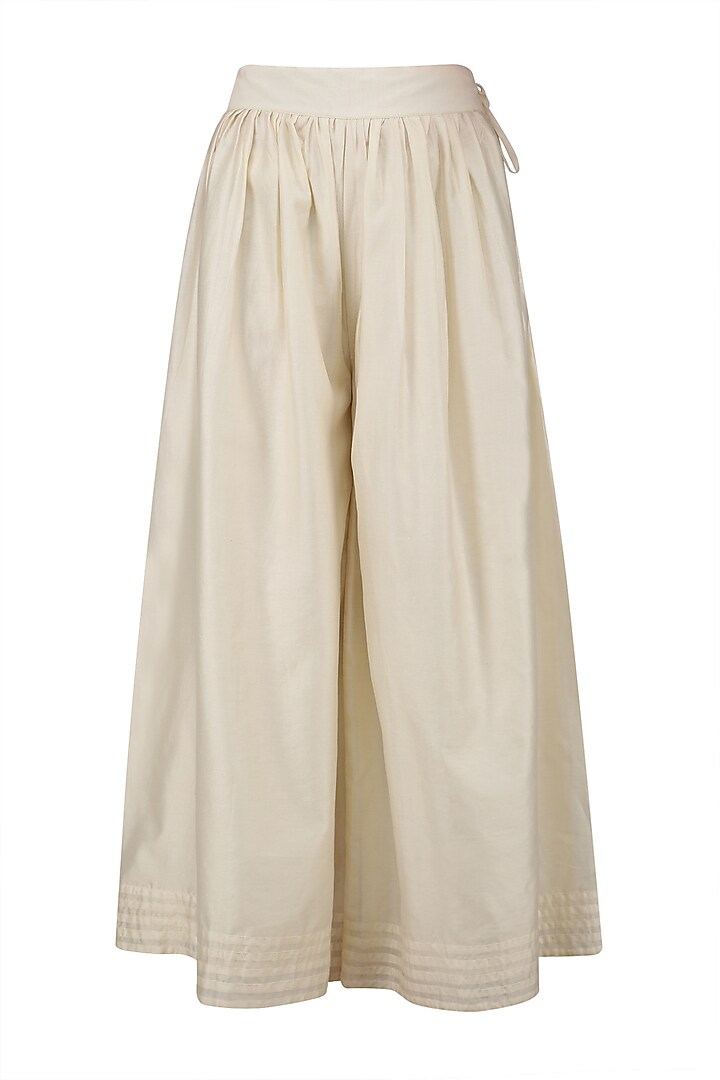 Pale orange pintuck kurta and off white palazzo pants set available only at Pernia's Pop Up Shop.