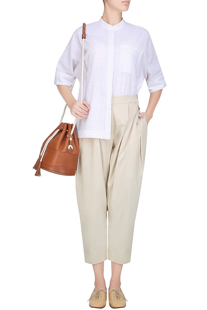 Beige double pleated high waist pants available only at Pernia's Pop Up Shop.