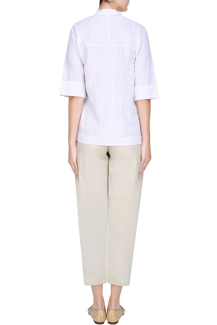 Beige double pleated high waist pants available only at Pernia's Pop Up Shop.