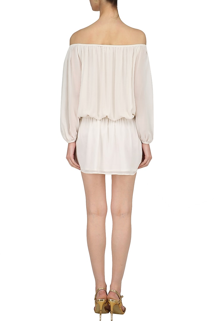 White motive embroidered Off shoulder dress available only at Pernia's Pop Up Shop.